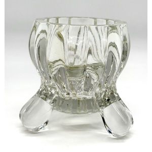 Vintage 1950's Jeannette Clear Crystal Candle Holder

Features National pattern